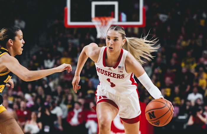 Nebraska's Jaz Shelley dribbles the ball upcourt against the Hawkeyes during the first half Sunday at Pinnacle Bank Arena in Lincoln.